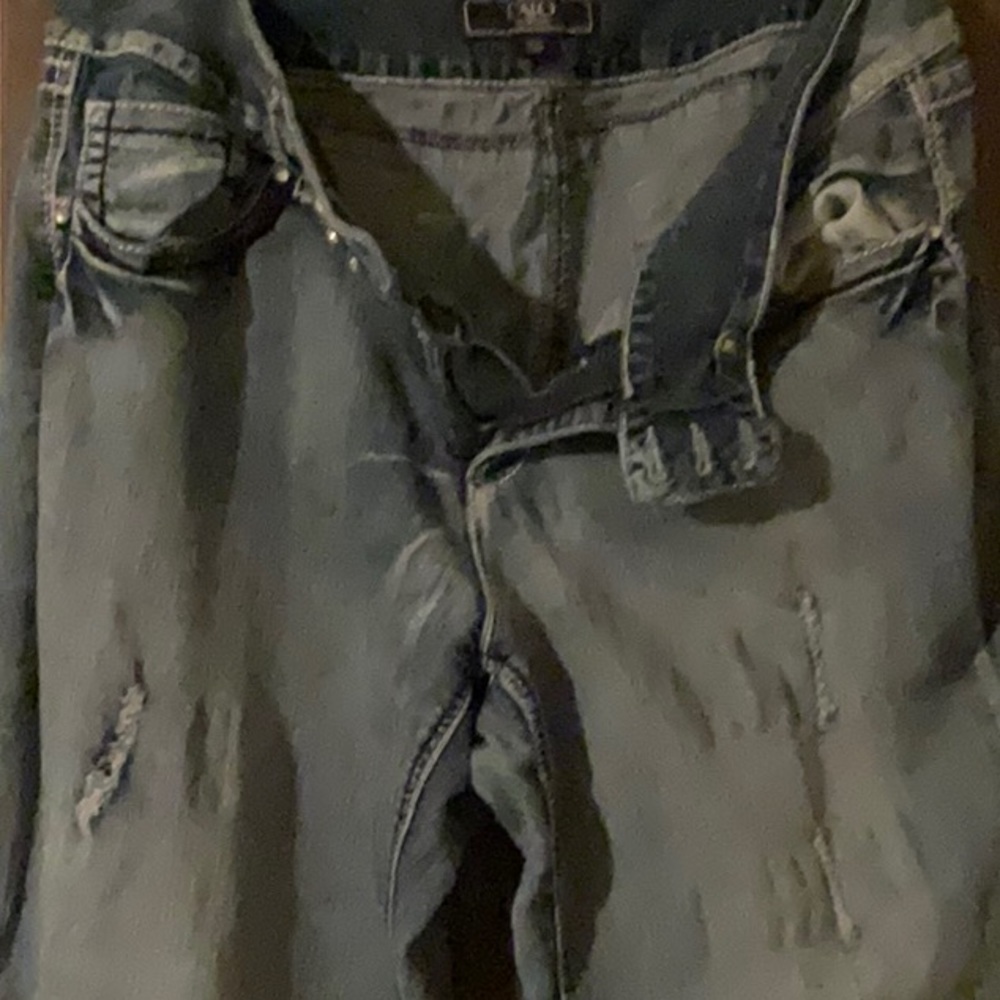 Boot cut, ripped jeans